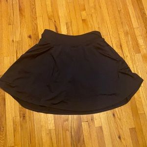 Black long comfortable skirt with shorts and three pockets size . Large